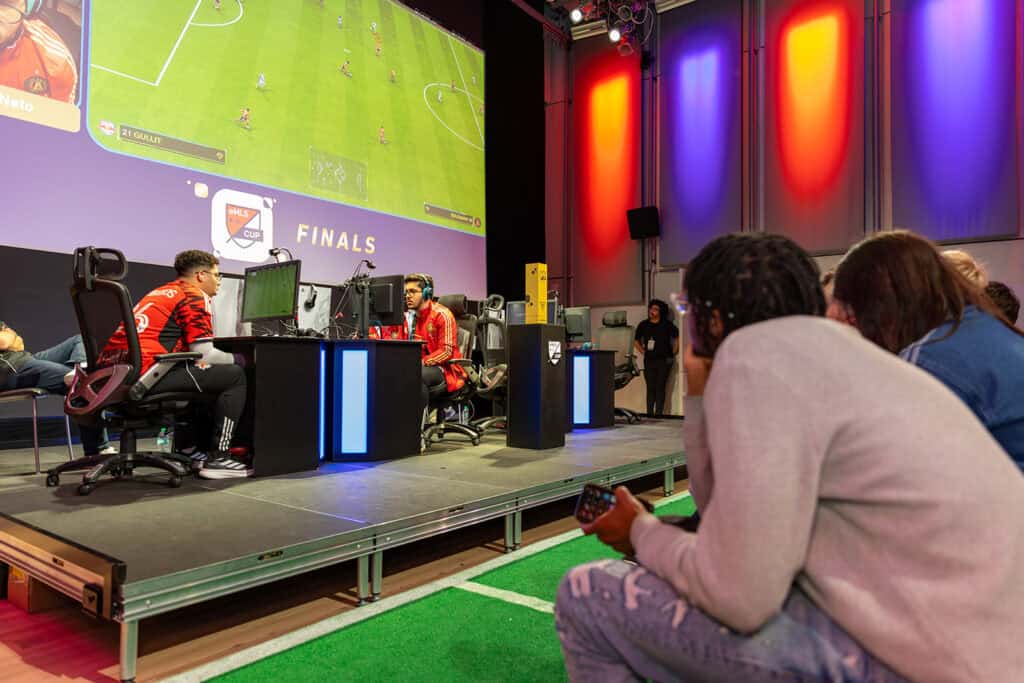 Fans watching the eMLS Cup Final, showcasing the excitement and energy of next-gen sports fandom with Major League Soccer